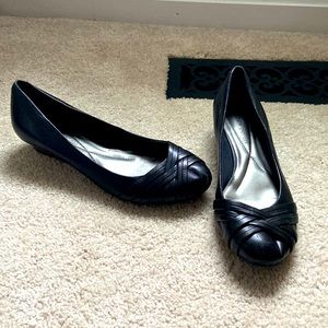 Black Andrew Geller slip on shoes with mini heel.